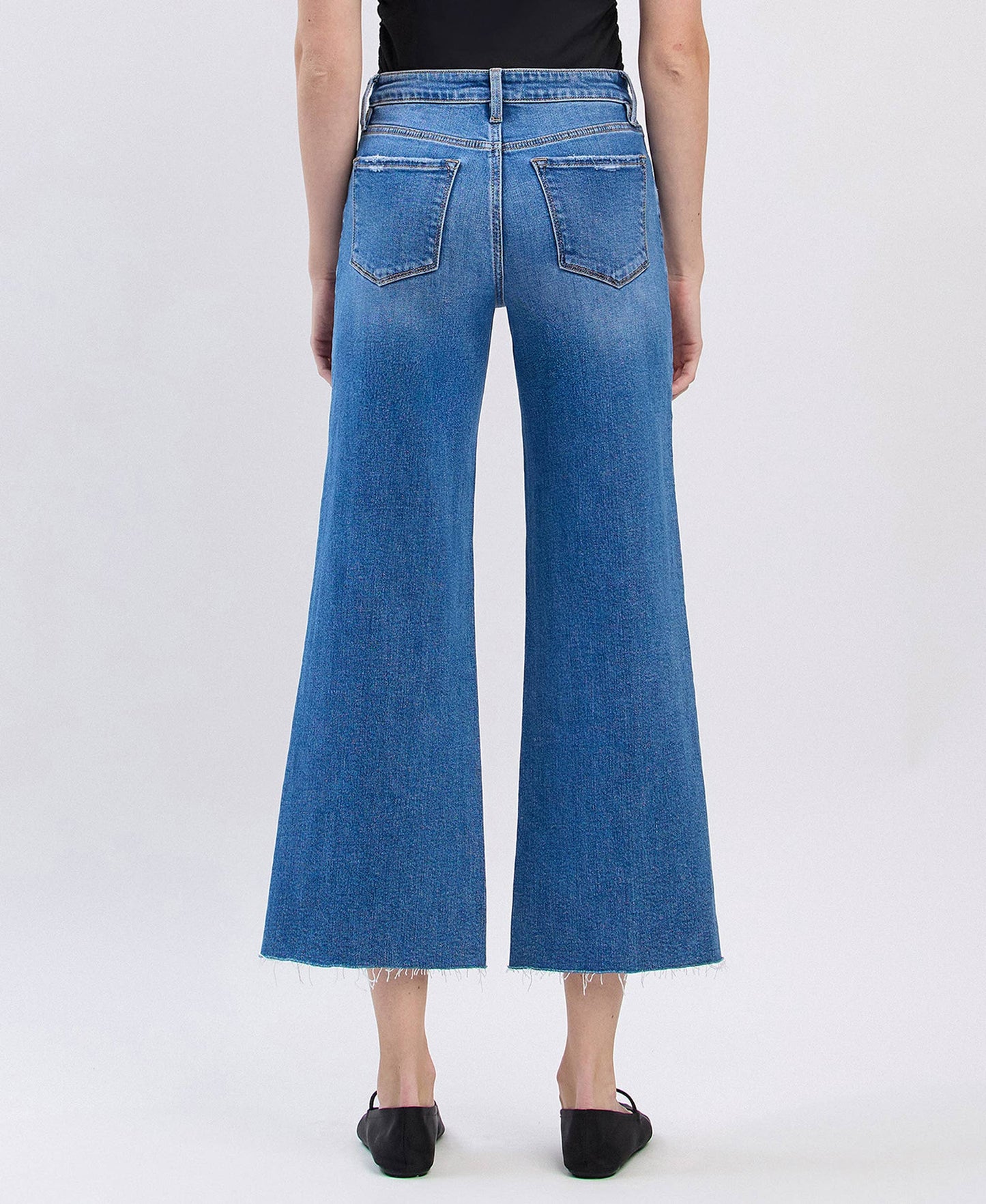 HIGH RISE RAW HEM TWIST WIDE JEANS