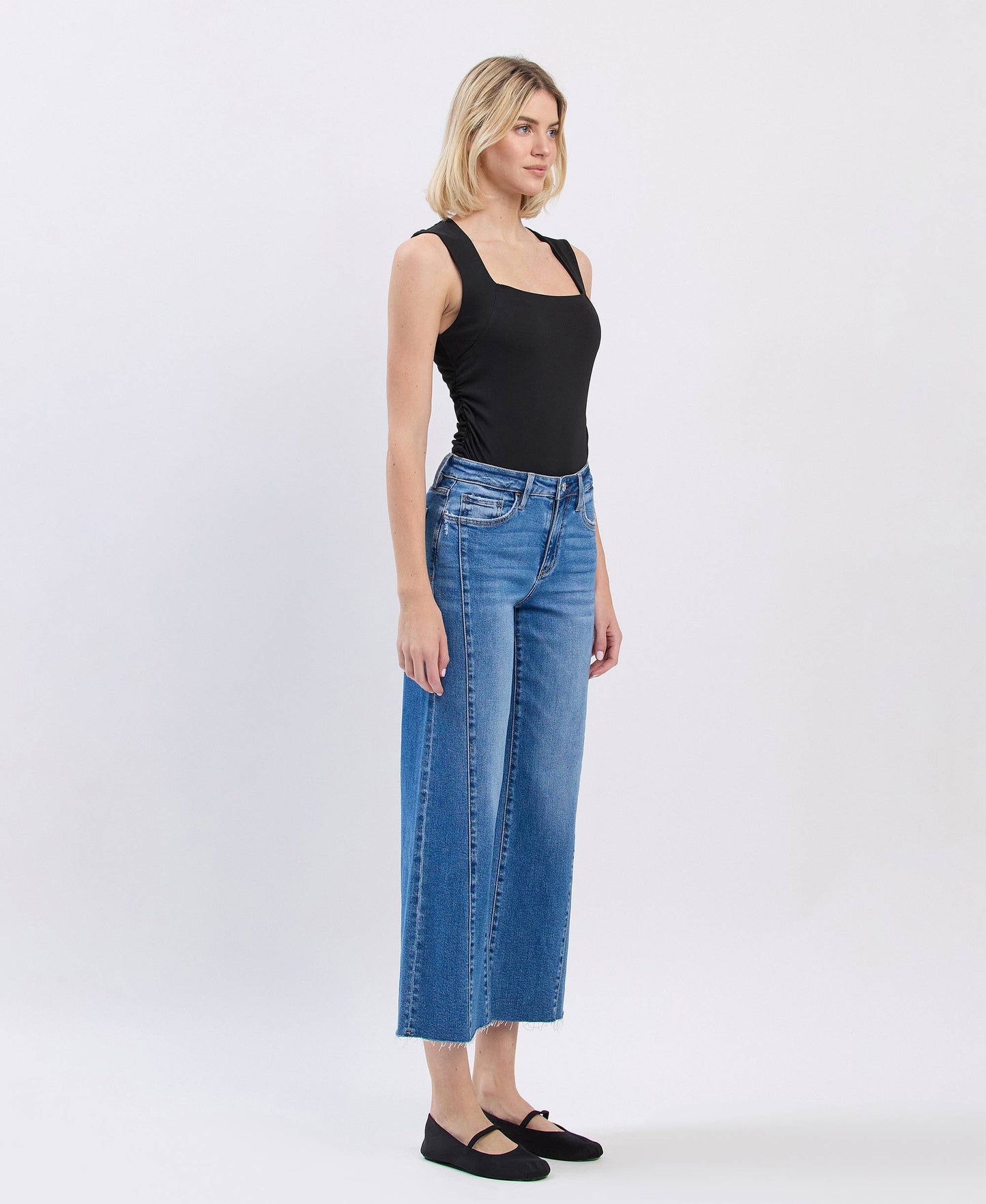 HIGH RISE RAW HEM TWIST WIDE JEANS