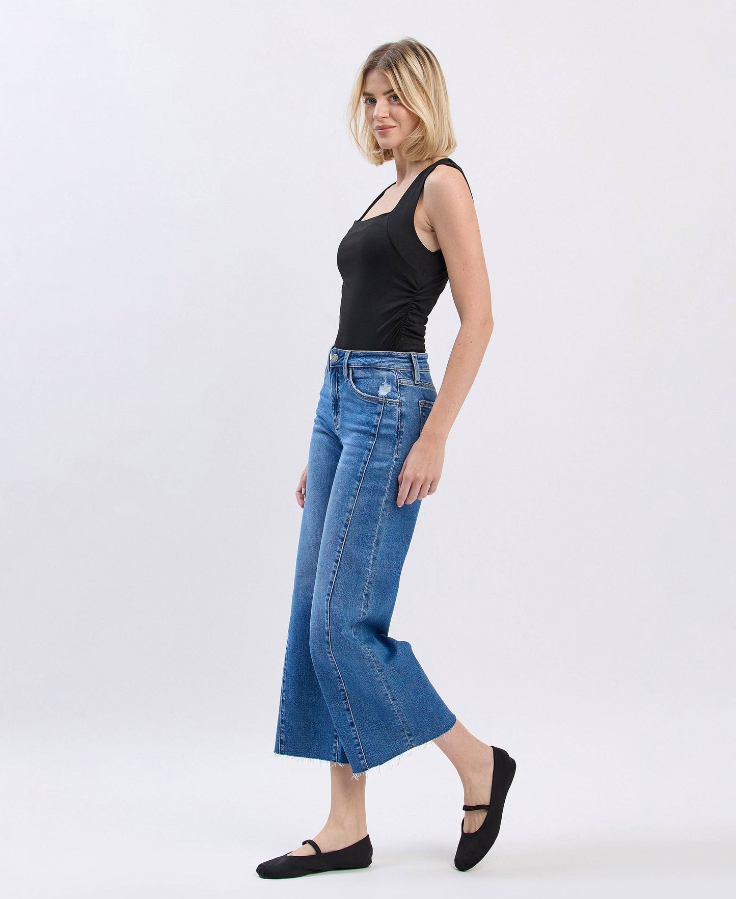HIGH RISE RAW HEM TWIST WIDE JEANS