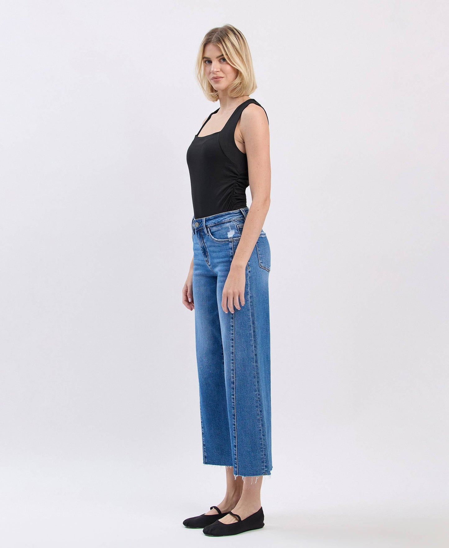 HIGH RISE RAW HEM TWIST WIDE JEANS